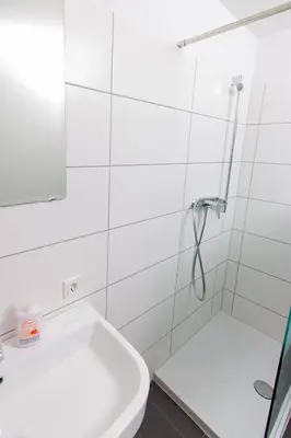 Ein Badezimmer in der Unterkunft Ferienwohnung T. Müllers | Nr. 2