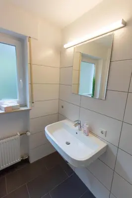 Ein Badezimmer in der Unterkunft Ferienwohnung T. Müllers | Nr. 2