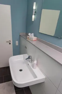 Ein Badezimmer in der Unterkunft Ferienwohnung T. Müllers | Nr. 1