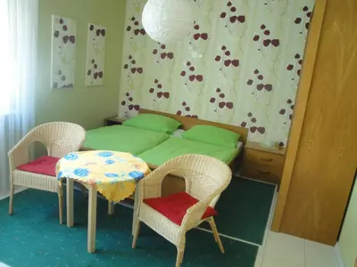 Ein Sitzbereich in der Unterkunft Gästehaus Andrea Blatt