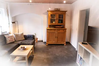 Ein Sitzbereich in der Unterkunft Ferienwohnung & Apartment Am Steinbrunnen
