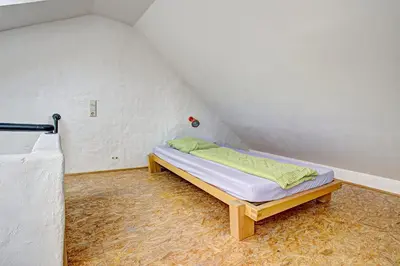 Ein Bett oder Betten in einem Zimmer der Unterkunft Ferienhaus Ehrenpreis