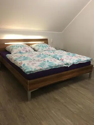 Ein Bett oder Betten in einem Zimmer der Unterkunft Ferienhaus Auf der Hill