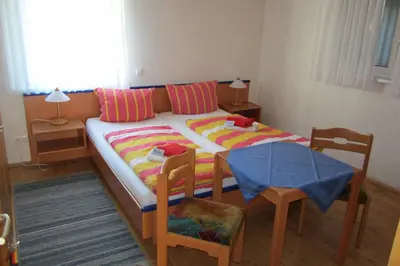 Ein Bett oder Betten in einem Zimmer der Unterkunft Gästehaus Ströter