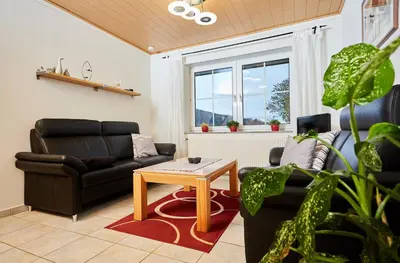 Ein Sitzbereich in der Unterkunft Ferienwohnung Leitges