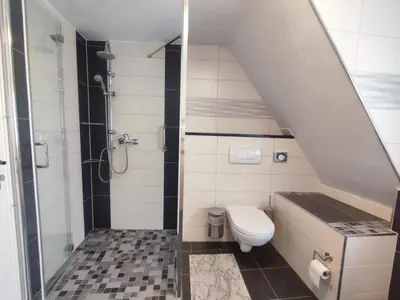 Ein Badezimmer in der Unterkunft Gästehaus im Alten Fährhaus