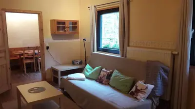 Ein Sitzbereich in der Unterkunft Neumühle