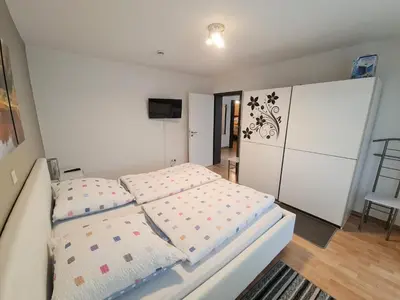 Ein Bett oder Betten in einem Zimmer der Unterkunft Ferienhaus Clarissa
