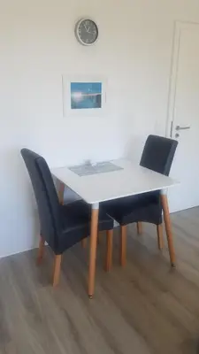 Ein Sitzbereich in der Unterkunft Ferienwohnungen Haus Talblick