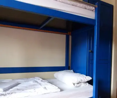 Ein Bett oder Betten in einem Zimmer der Unterkunft Kolping Hostel Trier im Warsberger Hof