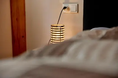 Ein Bett oder Betten in einem Zimmer der Unterkunft Cafe Rosi