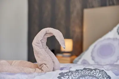 Ein Bett oder Betten in einem Zimmer der Unterkunft Cafe Rosi
