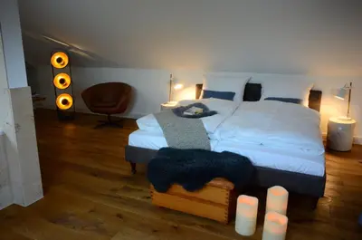 Ein Bett oder Betten in einem Zimmer der Unterkunft Eifelsuite
