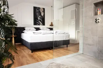 Ein Bett oder Betten in einem Zimmer der Unterkunft IchZeit Aparthotel