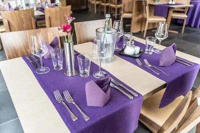 Ein Restaurant oder anderes Speiselokal in der Unterkunft Hotel Rieder
