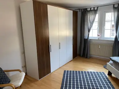 Ein Bett oder Betten in einem Zimmer der Unterkunft Wohnen bei den Brückenhäusern