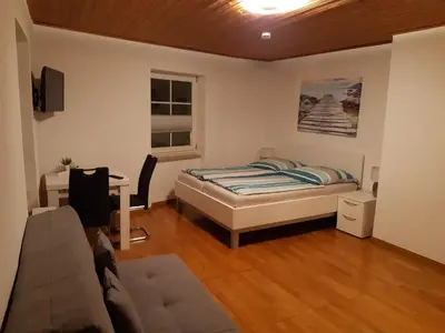 Ein Bett oder Betten in einem Zimmer der Unterkunft Ferienhaus Würzgarten