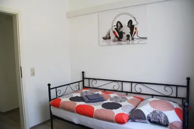 Ein Bett oder Betten in einem Zimmer der Unterkunft Geräumige 4 Zimmer Wohnung an den Kaiserthermen