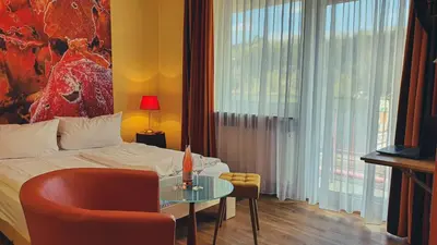 Ein Sitzbereich in der Unterkunft Hotel 
