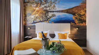 Ein Bett oder Betten in einem Zimmer der Unterkunft Hotel 