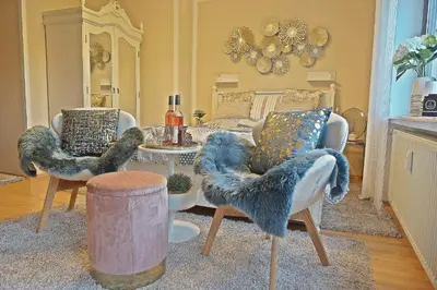 Ein Sitzbereich in der Unterkunft Appartment Indira