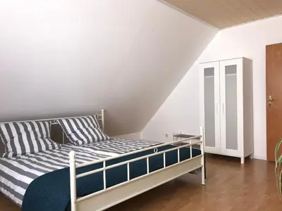 Ein Bett oder Betten in einem Zimmer der Unterkunft Ferienwohnung Jutta u. Andreas Arenz