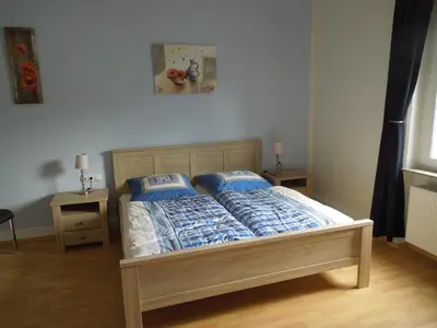 Ein Bett oder Betten in einem Zimmer der Unterkunft Weingut Nies