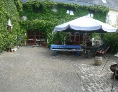 Ein Garten an der Unterkunft Stierstall-Suite Pension Wahlenau