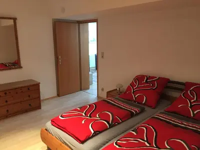 Ein Bett oder Betten in einem Zimmer der Unterkunft Ferienwohnung Mimi Souterrainwohnung