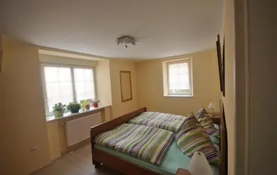 Ein Bett oder Betten in einem Zimmer der Unterkunft Ferienwohnung Moog