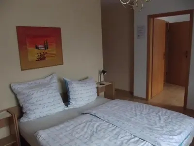 Ein Bett oder Betten in einem Zimmer der Unterkunft Hotel Haus Irsfeld