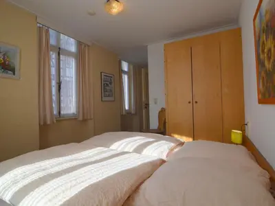 Ein Bett oder Betten in einem Zimmer der Unterkunft Urzig Heritage Riverside Stay