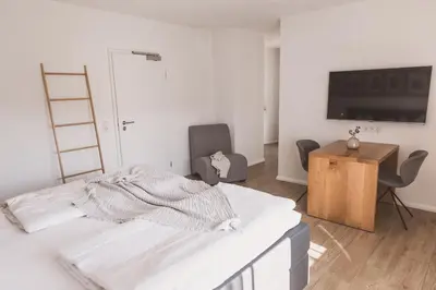 Ein Bett oder Betten in einem Zimmer der Unterkunft Weingut Gehlen-Cornelius