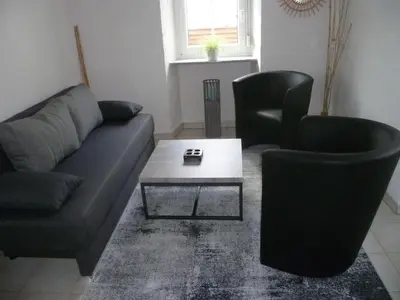 Ein Sitzbereich in der Unterkunft Ferienwohnung Ehlen im Alten Winzerhaus