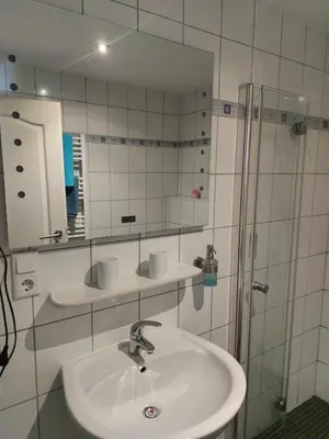 Ein Badezimmer in der Unterkunft Pension Belzer