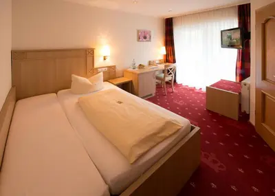 Ein Bett oder Betten in einem Zimmer der Unterkunft Hotel & Restaurant Krone