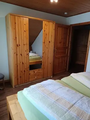 Ein Bett oder Betten in einem Zimmer der Unterkunft Ferienwohnung Kittel