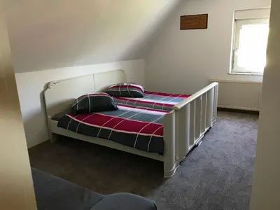 Ein Bett oder Betten in einem Zimmer der Unterkunft Haus Irmgard