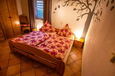 Ein Bett oder Betten in einem Zimmer der Unterkunft Ferienwohnung am Eifelsteig Vulkaneifel-Auszeit