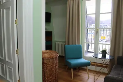 Ein Sitzbereich in der Unterkunft Logierhaus Stadt Lyon