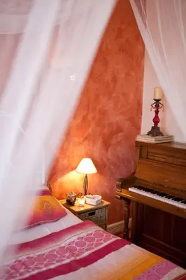 Ein Bett oder Betten in einem Zimmer der Unterkunft Ferienwohnung Burgzauber