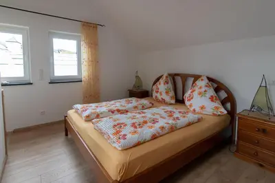 Ein Bett oder Betten in einem Zimmer der Unterkunft Apartment Eva