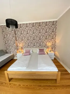Ein Bett oder Betten in einem Zimmer der Unterkunft Villa Evin