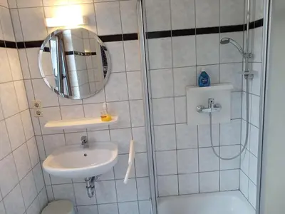 Ein Badezimmer in der Unterkunft Hotel Kremer