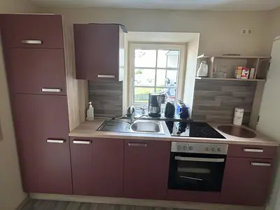 Küche/Küchenzeile in der Unterkunft 19 Im Herrenfeld