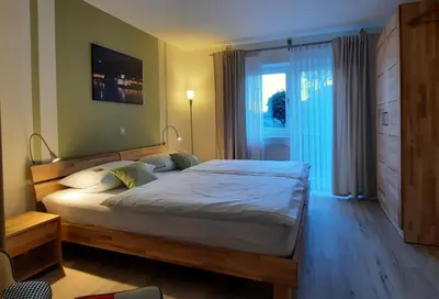 Ein Bett oder Betten in einem Zimmer der Unterkunft Ferienwohnung Bappert