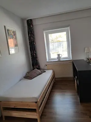 Ein Bett oder Betten in einem Zimmer der Unterkunft Fewo Kastel