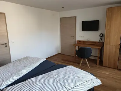 Ein Bett oder Betten in einem Zimmer der Unterkunft Beim Hooch. Egon