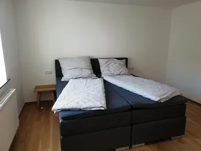 Ein Bett oder Betten in einem Zimmer der Unterkunft Beim Hooch. Doris