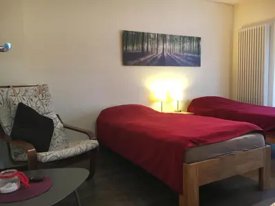 Ein Bett oder Betten in einem Zimmer der Unterkunft Ferienwohnung Helga